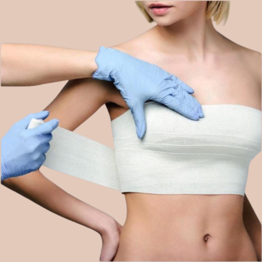 Doctor applying post surgery bandage on female breast after breast surgery at Cocoona Gurgaon