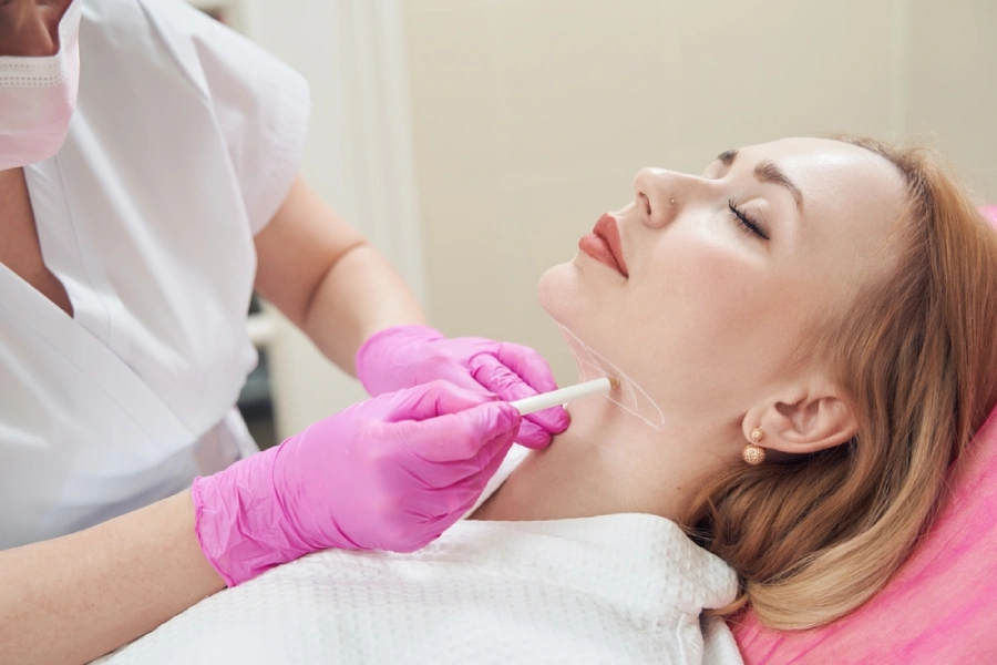 Woman preparing for neck lift surgery