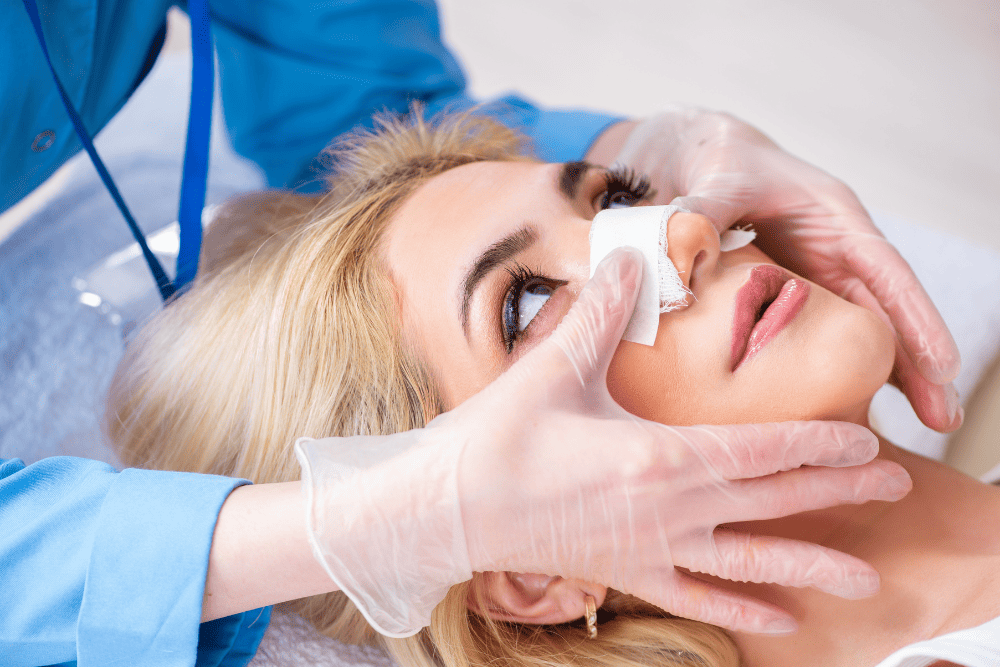 Young woman is prepared for nose surgery